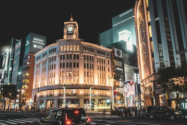 A department store building in Ginza lit up at night